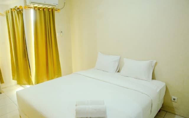 Modern Studio Grand Serpong Apartment By Travelio - photo 1