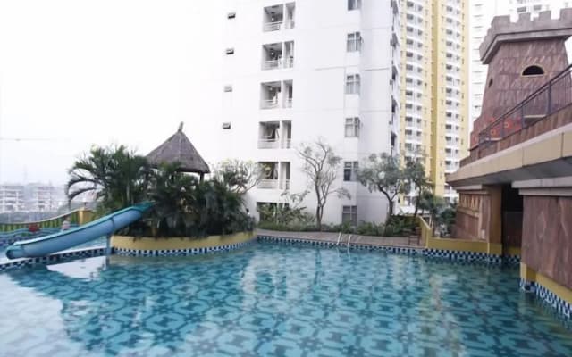 Modern Studio Grand Serpong Apartment By Travelio - photo 2