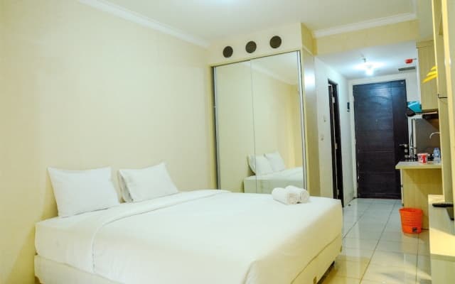 Modern Studio Grand Serpong Apartment By Travelio - photo 5